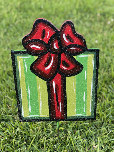 Christmas presentwith verticle bow painted  yard art design