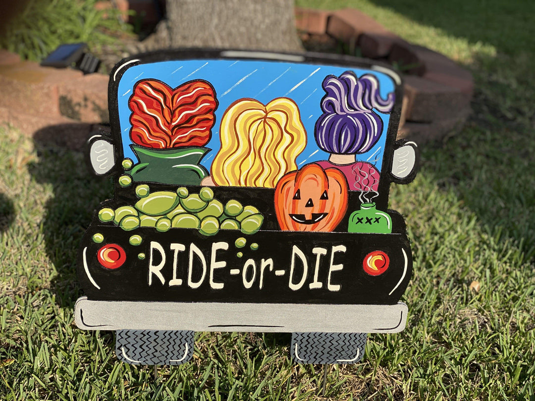 ride-or-die witch pick up truck painted yard art design