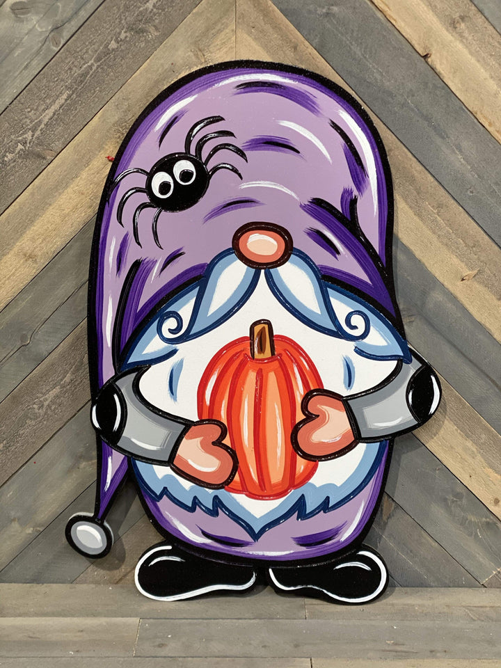 gnome holding pumpkin painted yard art design