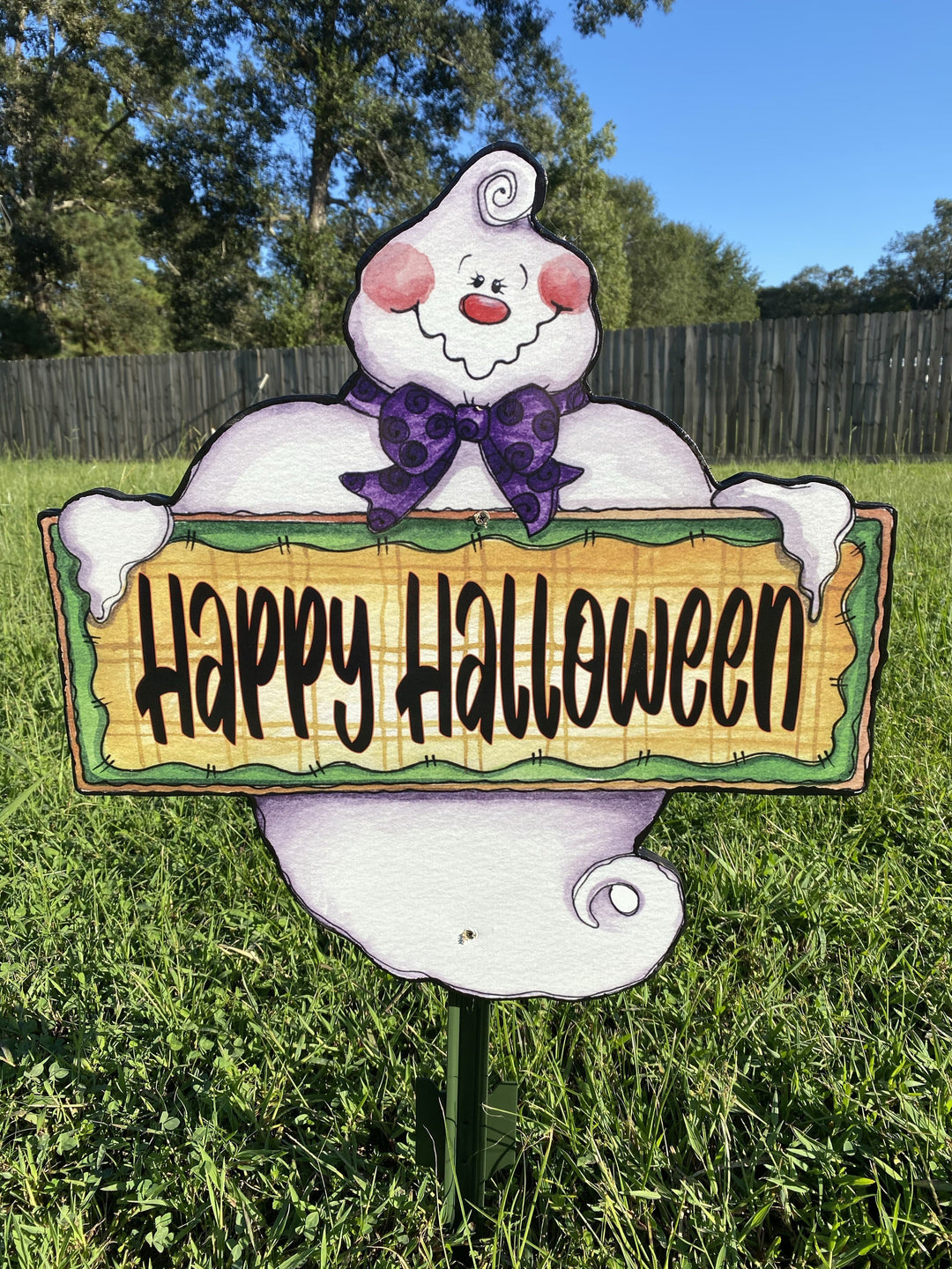 Ghost Holding Happy Halloween Sign