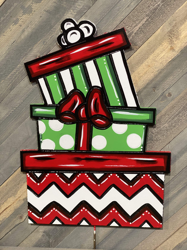 triple stacked presents painted yard art design