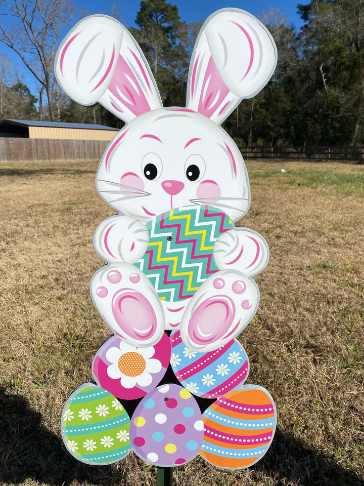 Happy Easter Bunny Sits on Stacked Eggs Outdoor Decoration