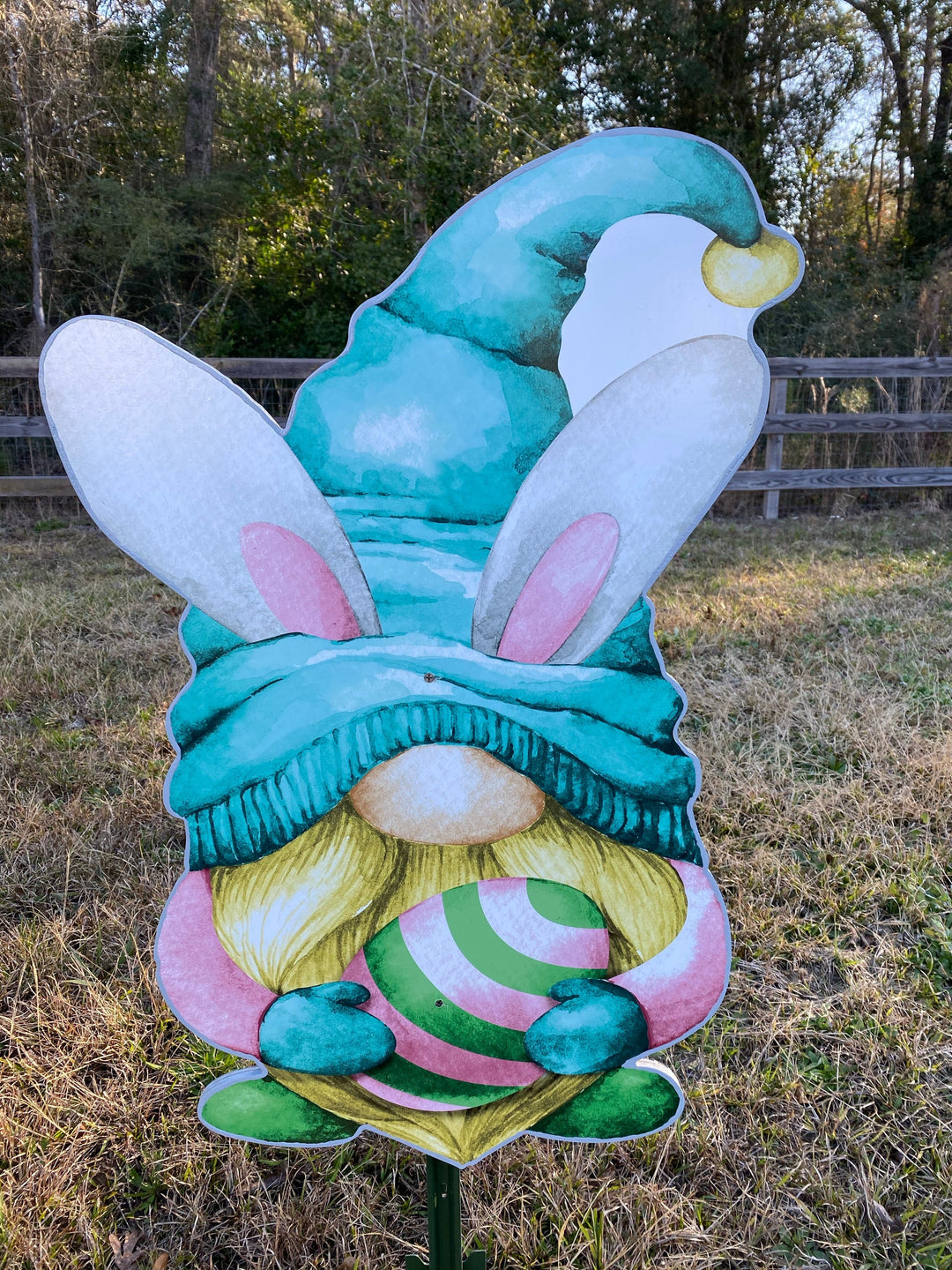 Easter Gnome holds striped Egg with Bunny Ears Outdoor Decoration