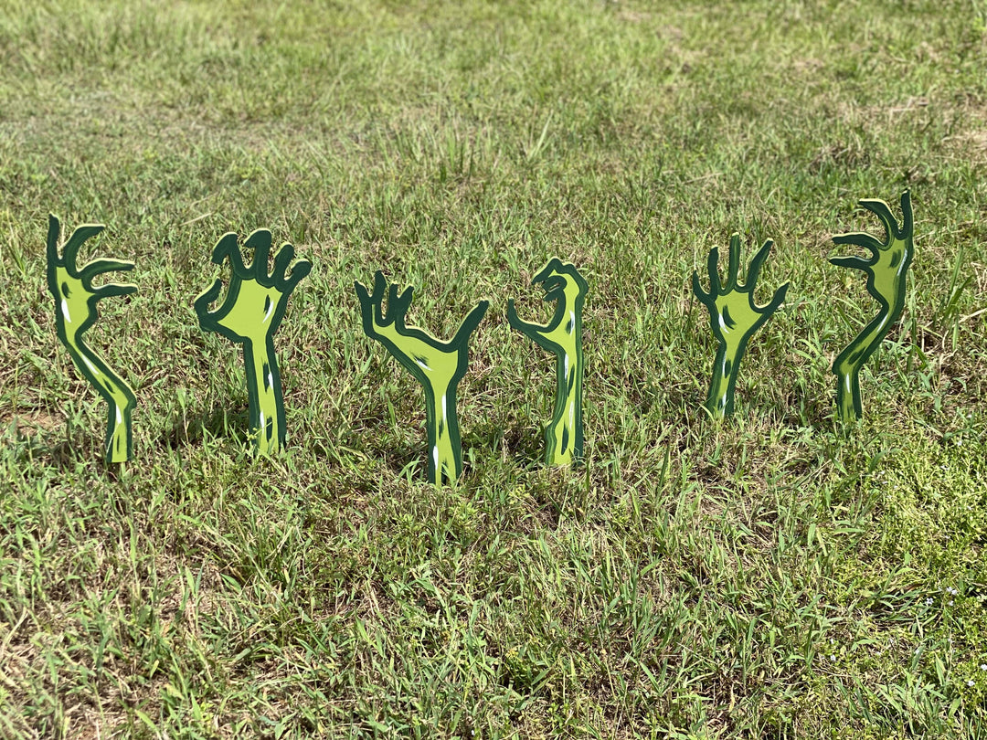 zombie hads painted yard art design