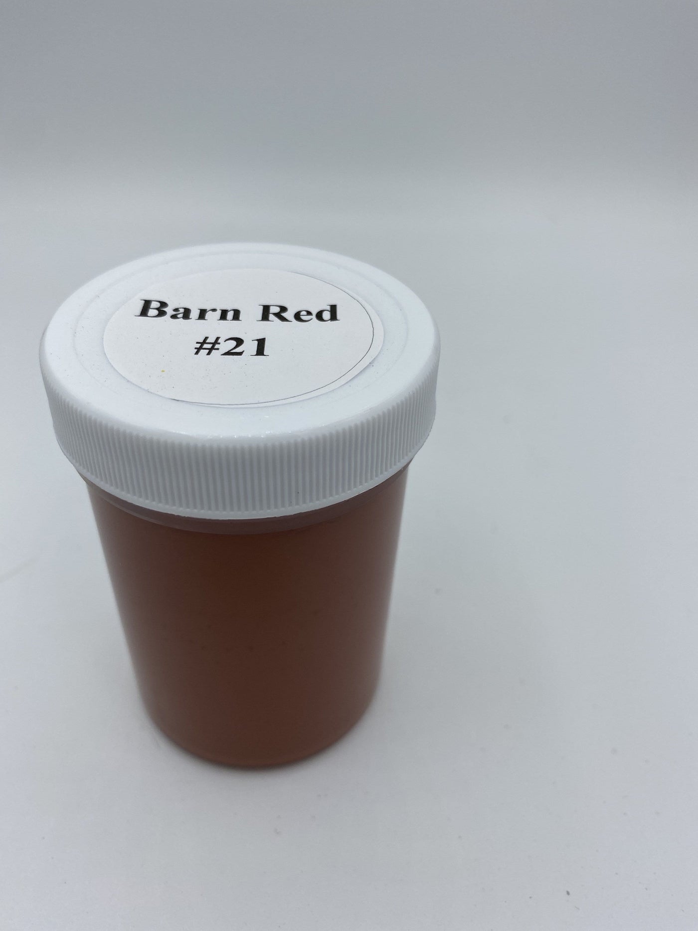 barn red exterior yard art paint